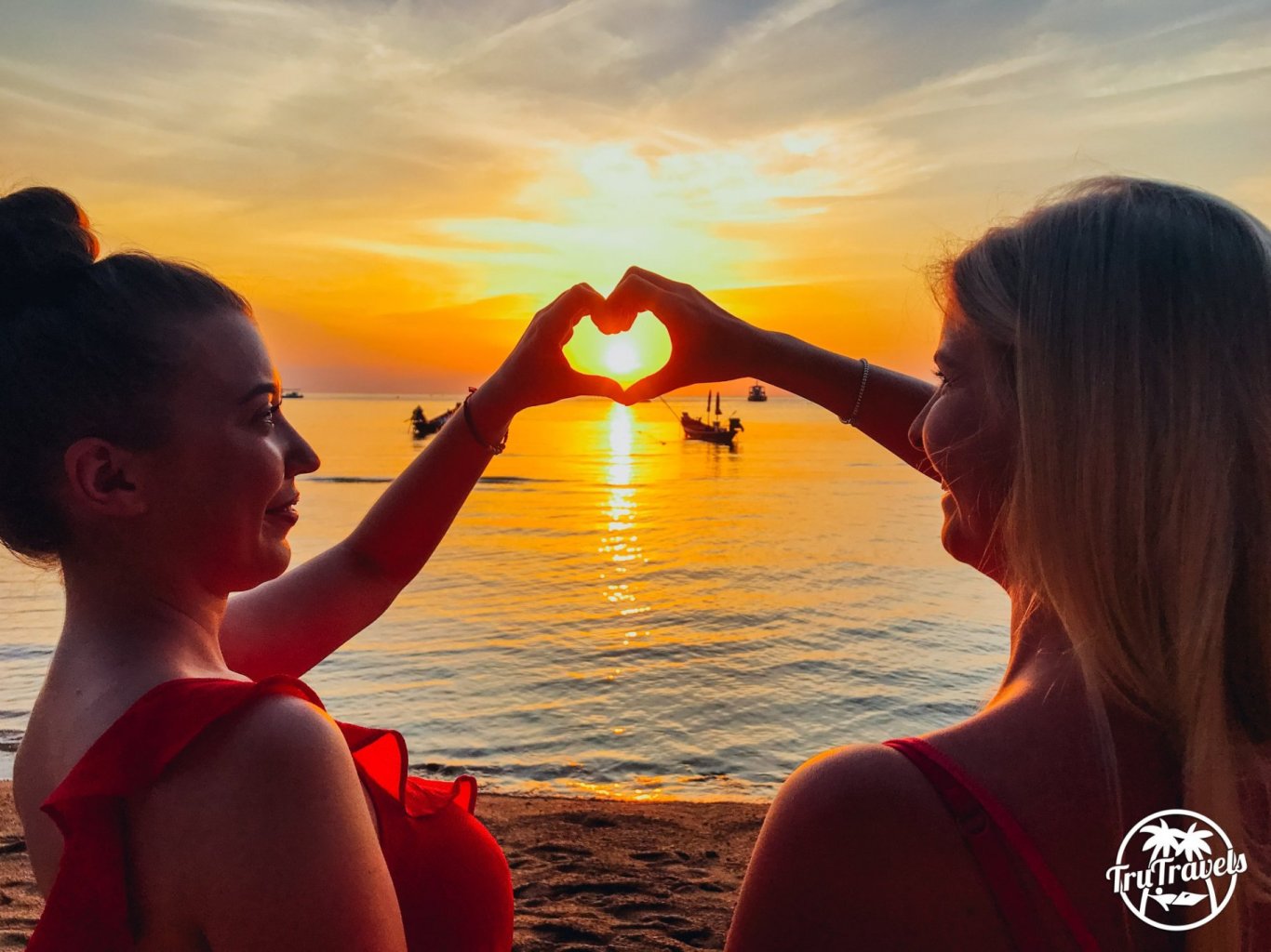 Sunset on beach, girls love heart 