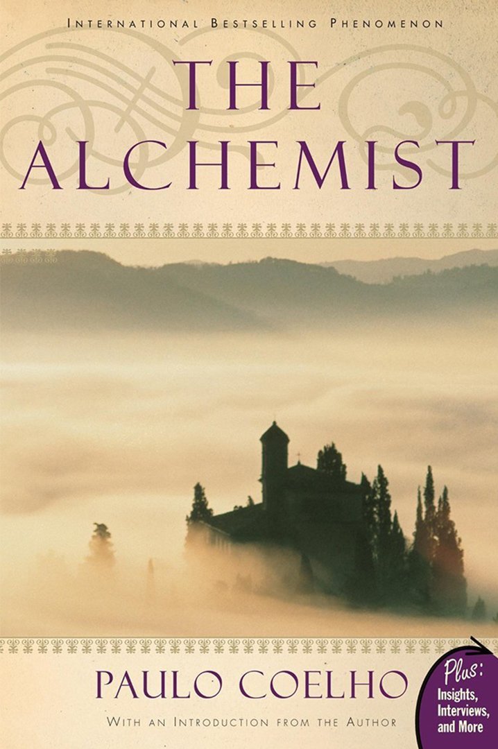 The alchemist book cover - misty sky with building in the distance