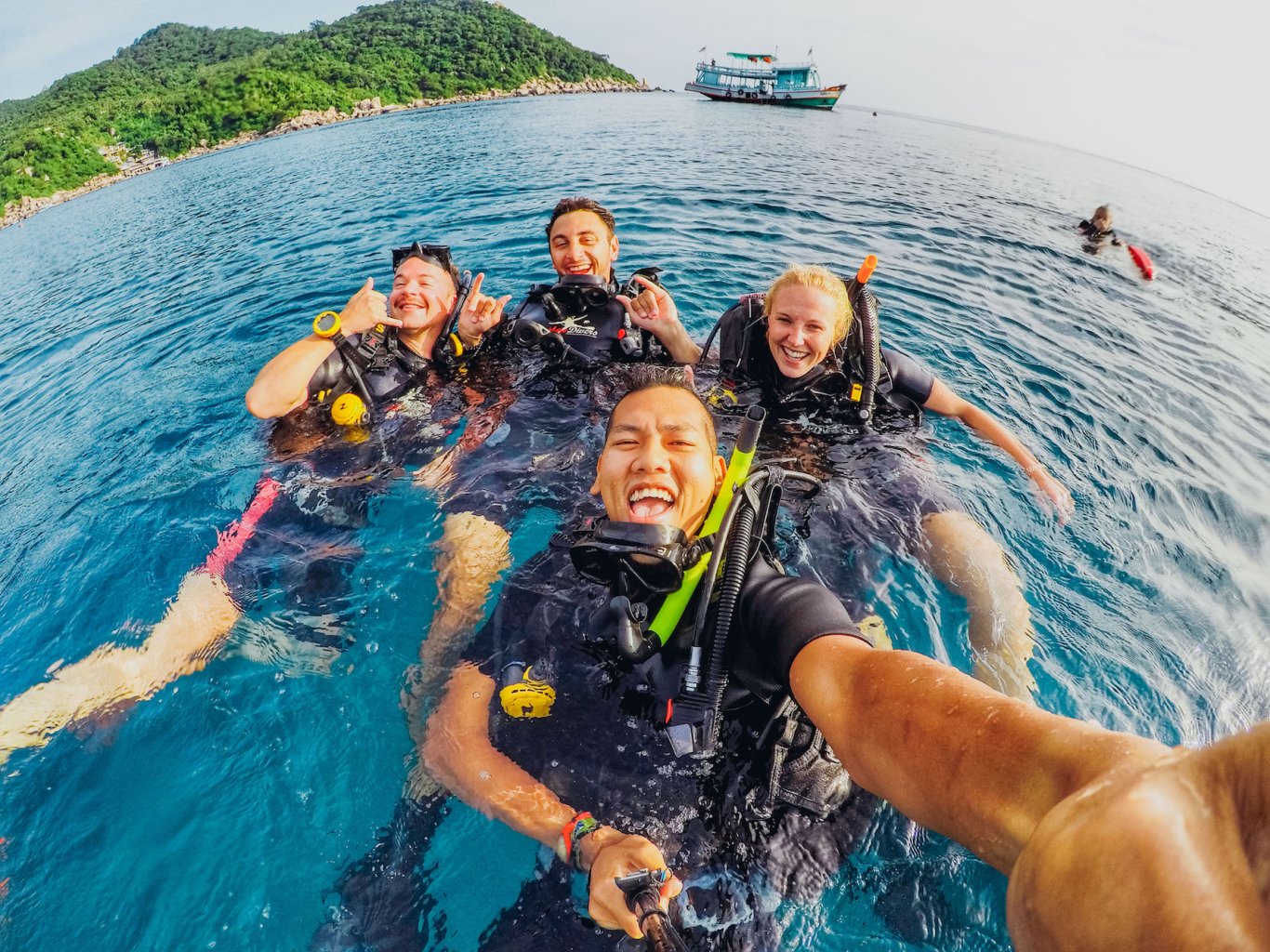 group of friends scuba diving - Borneo