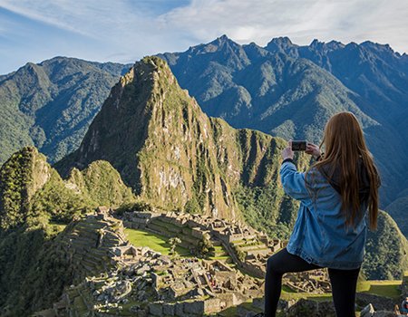 Machu Picchu, Peru. Tourist walking around to explore the wonder of the world