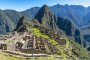 Machu Picchu surrounded by moutains and blue sky - Peru