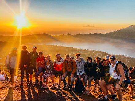 A group shot while hiking Mount Batur at sunrise in Bali, Indonesia 