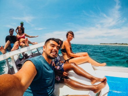 A group selfie on a boat while on a snorkelling trip in Gili Trawangan, Indonesia 