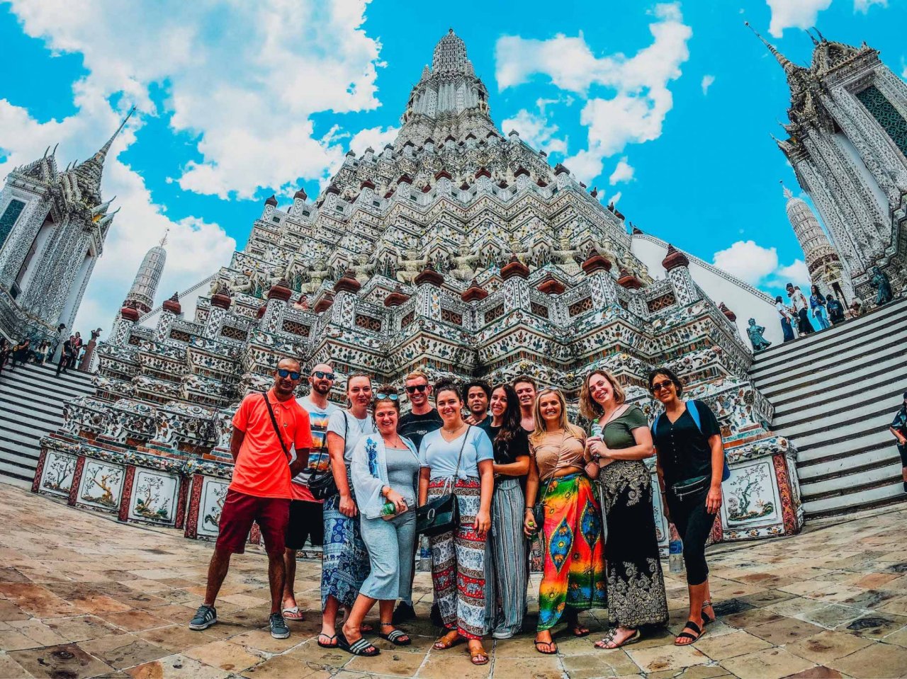 group standing in front of temple in Bangkok