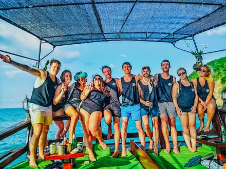 A group photo on the boat in Koh Phangan Thailand 