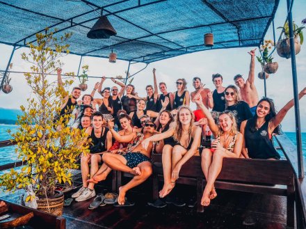 A fun group photo on a boat in Koh Phangan Thailand 