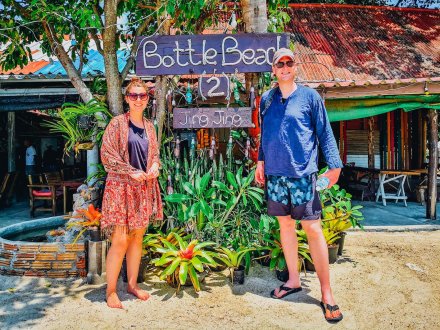 A couple at enjoying time at bottle beach Koh Phangan Thailand 
