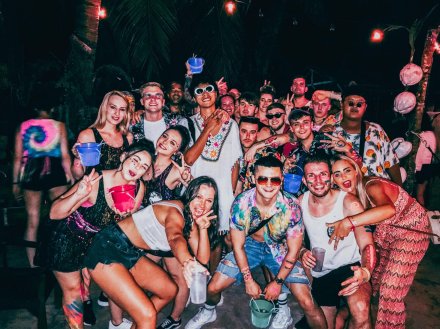Group photo at the full moon party in Koh Phangan Thailand 
