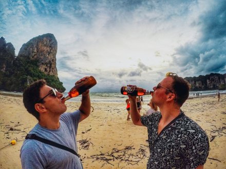 Drinking beer at Railay beach Thailand 