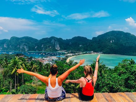 Two girls at the viewpoint in Koh Phi Phi Thailand overlooking the idyllic views
