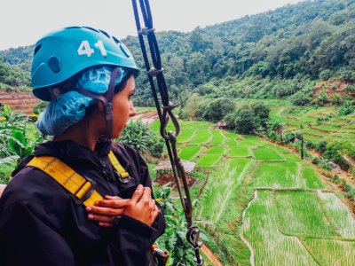 A girl about to go on the zip line in Chiang Mai Thailand